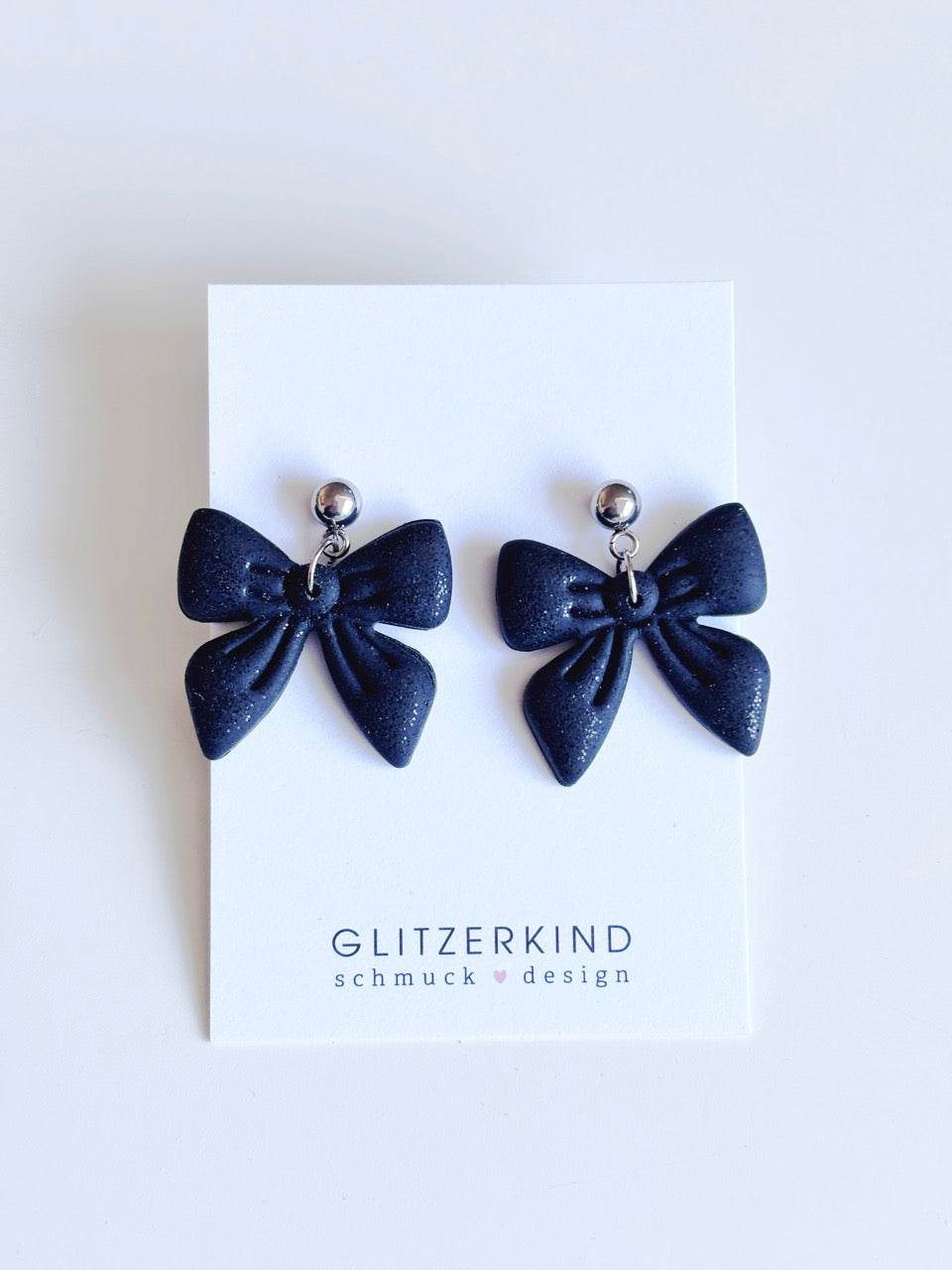 Ohrhänger Schleife schwarz Glitzer - silber