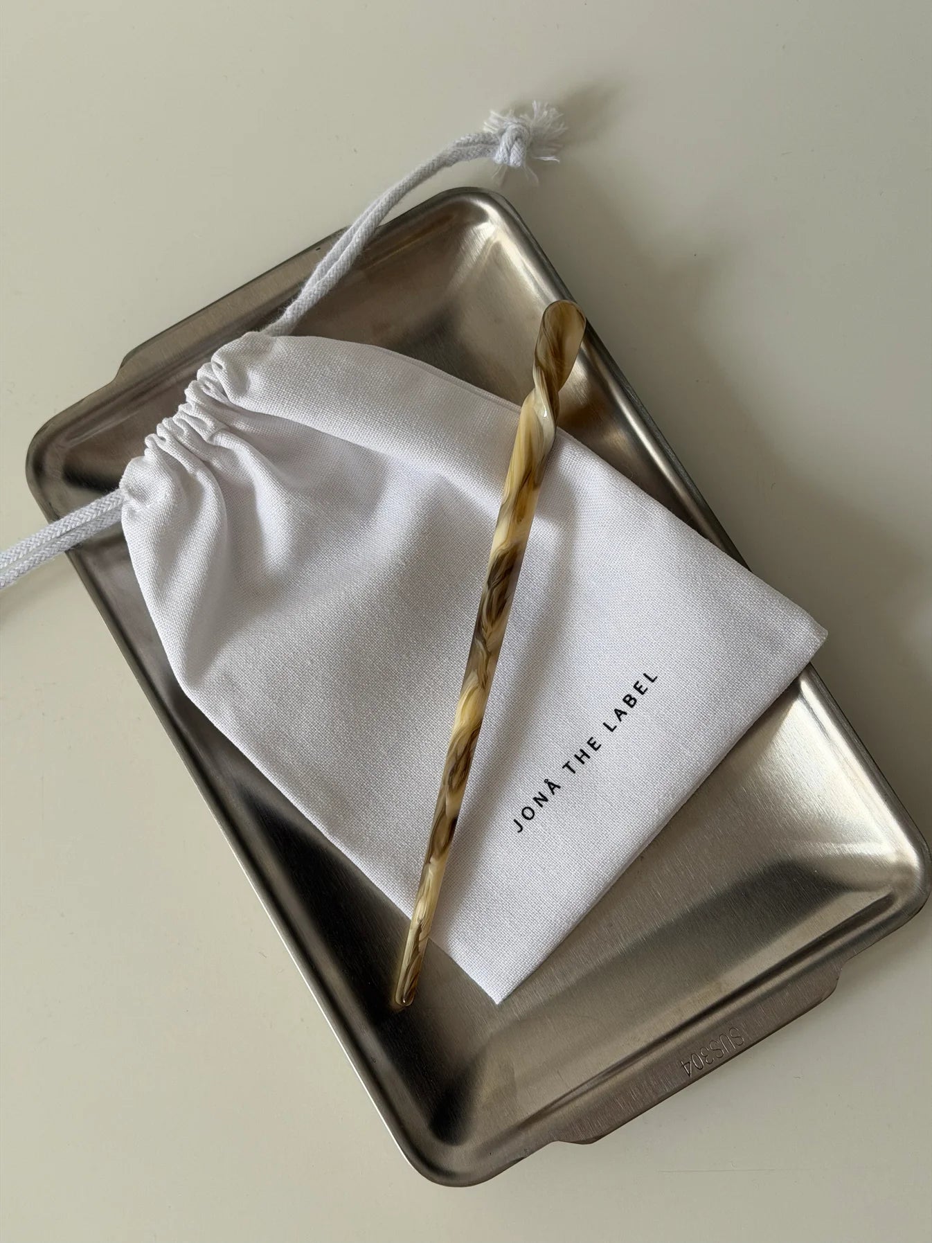 TWISTED HAIRPIN - sandstone