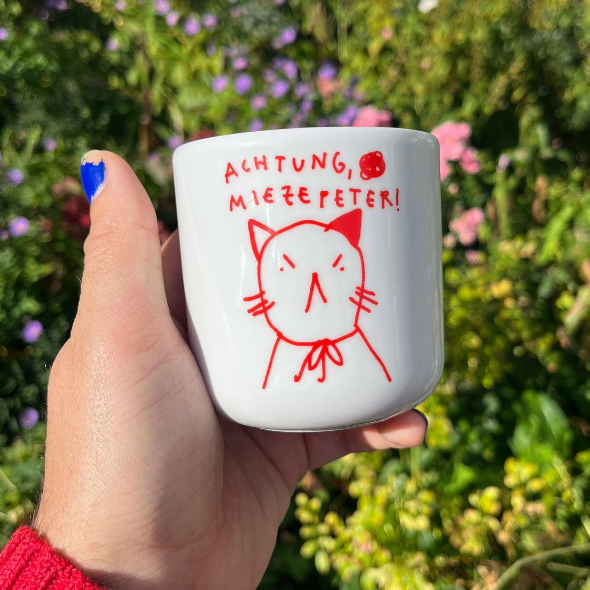Porzellanbecher "Achtung, Miezepeter!"